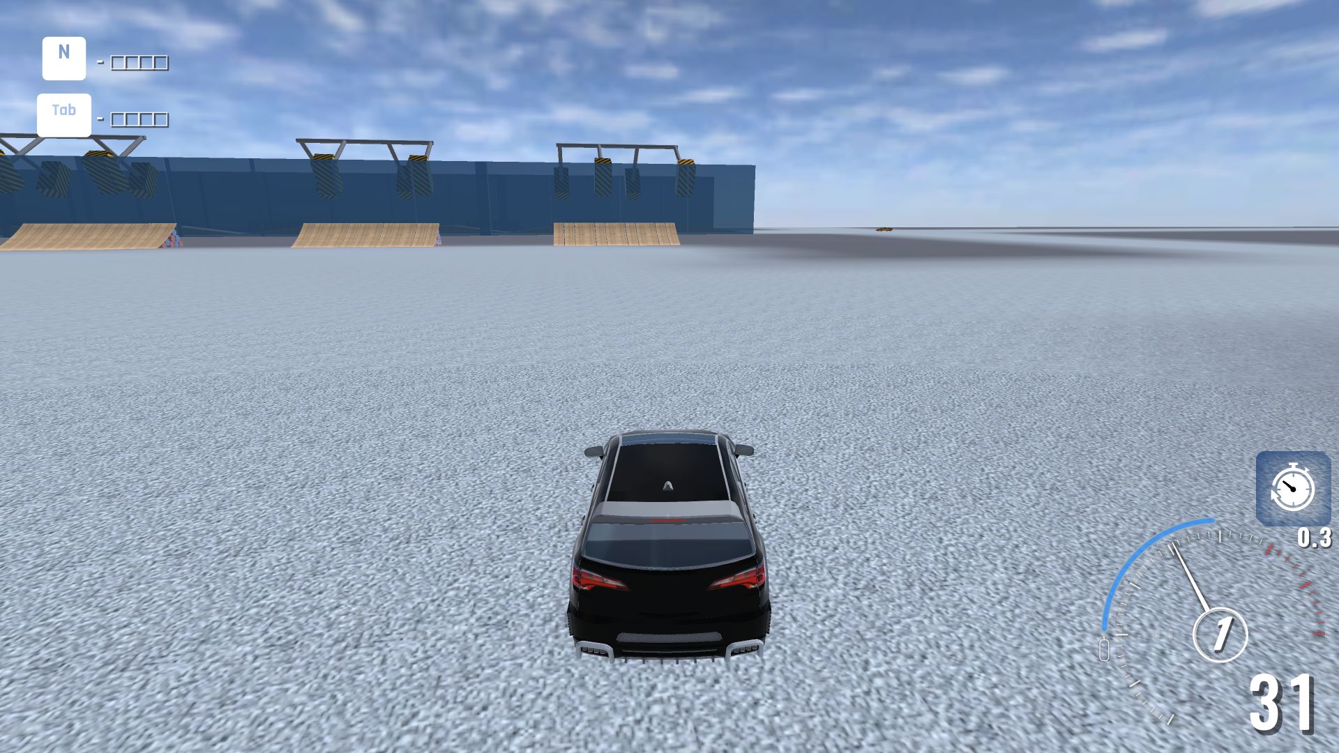 Wide camera view of the black SUV on BMG Crash Test's open testing floor