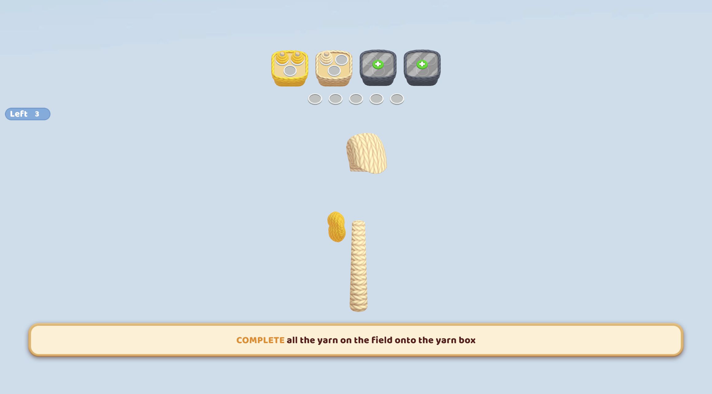 Yarn Fever board late in the level with two yellow spools and one cream spool collected